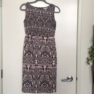 Light pink and black printed midi dress.